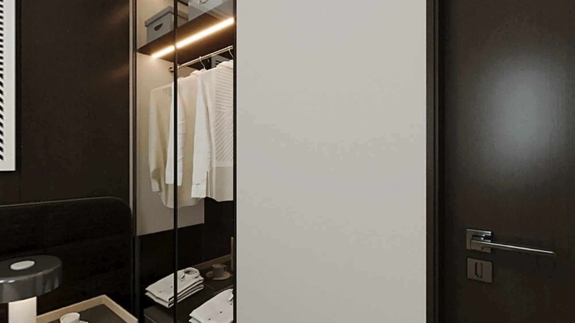 Dark bedroom wardrobe with open hanging storage and linear light