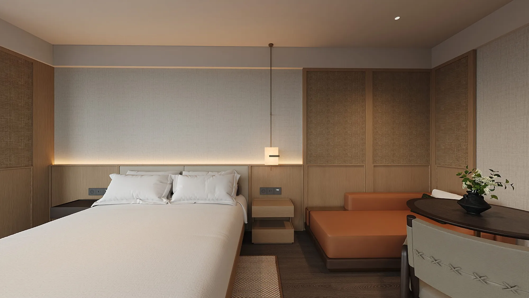 Deluxe hotel room with integrated window seating and pale timber joinery