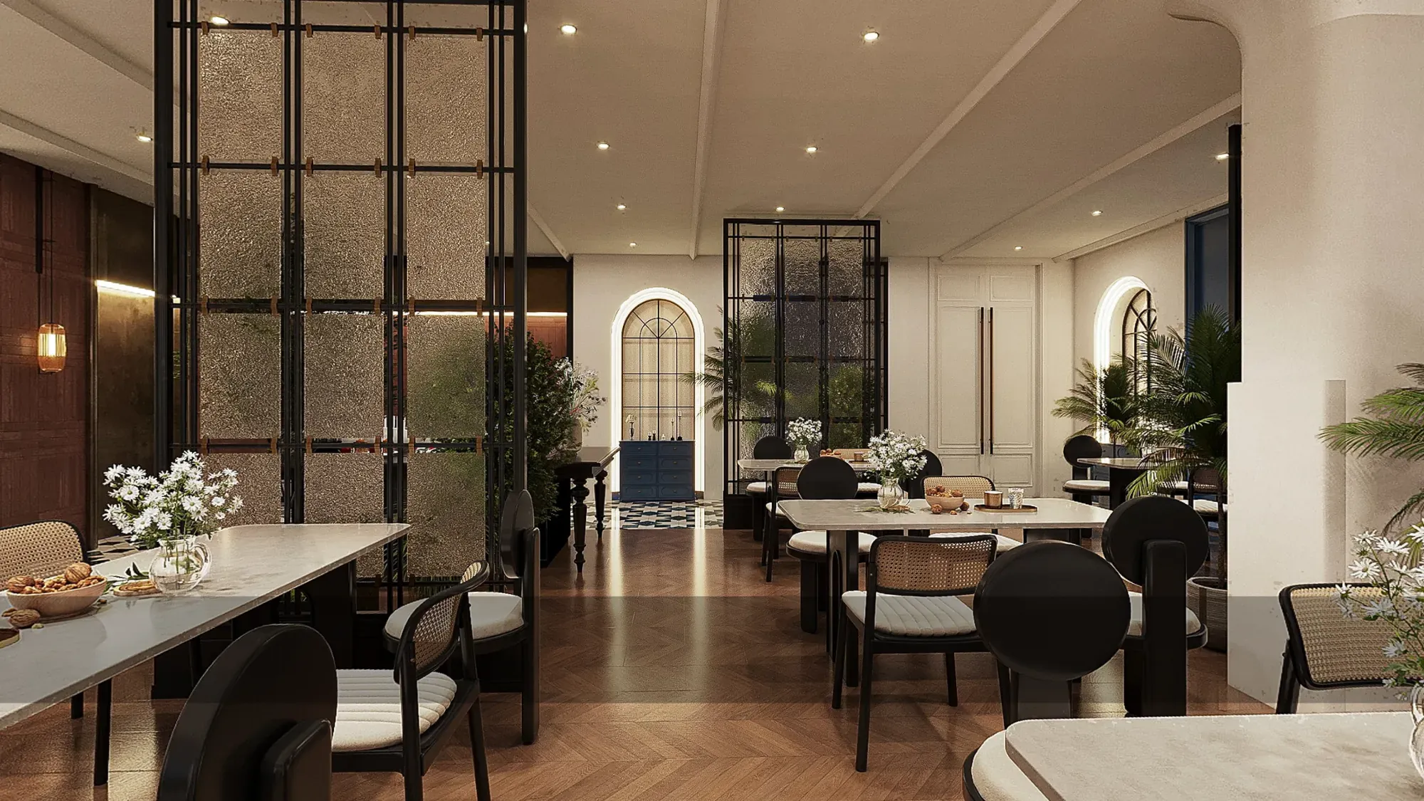 Hotel restaurant with arched openings and marble dining tables