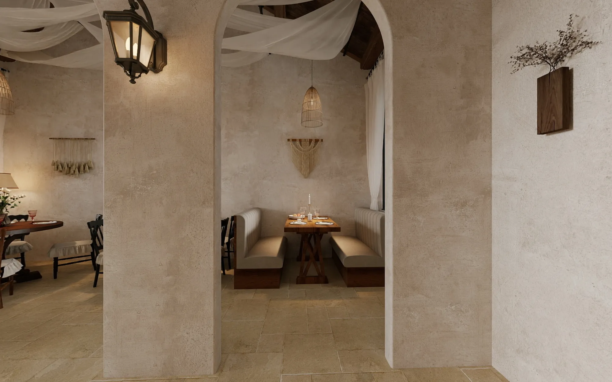 Intimate restaurant booth framed by a broad plaster arch