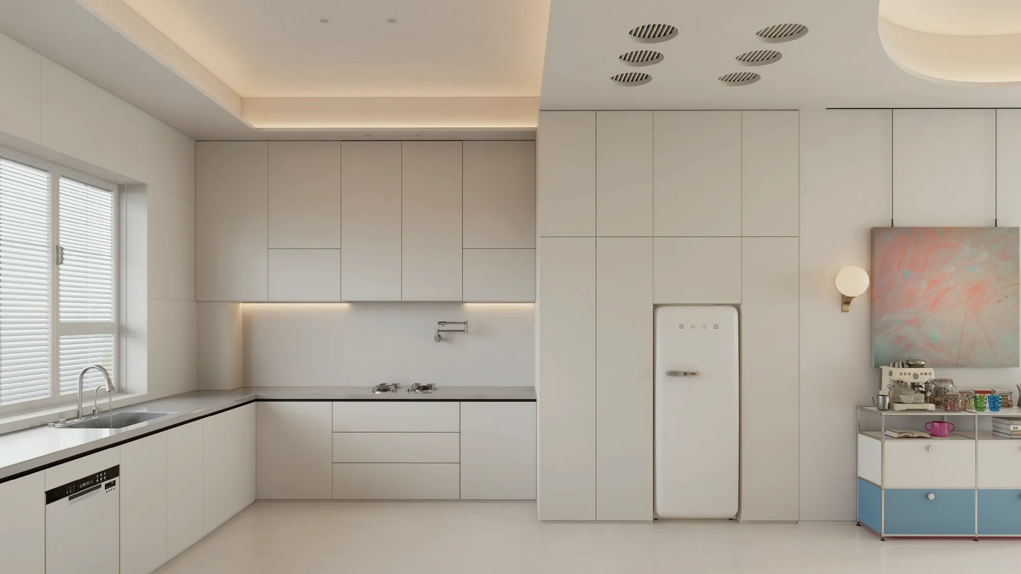 Minimal pale kitchen with concealed full-height cabinetry and integrated appliances