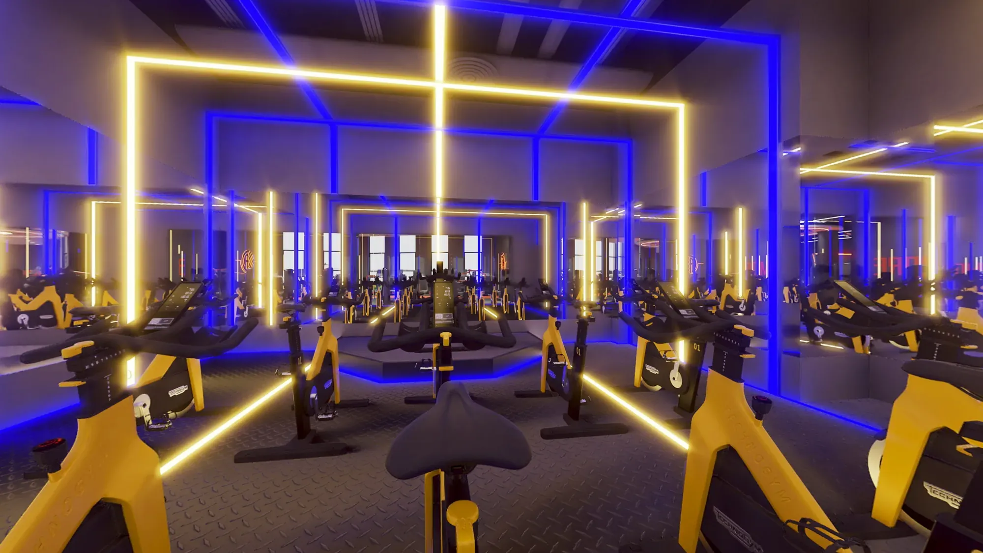 Indoor cycling studio with aligned bikes and blue-yellow LED ceiling grid
