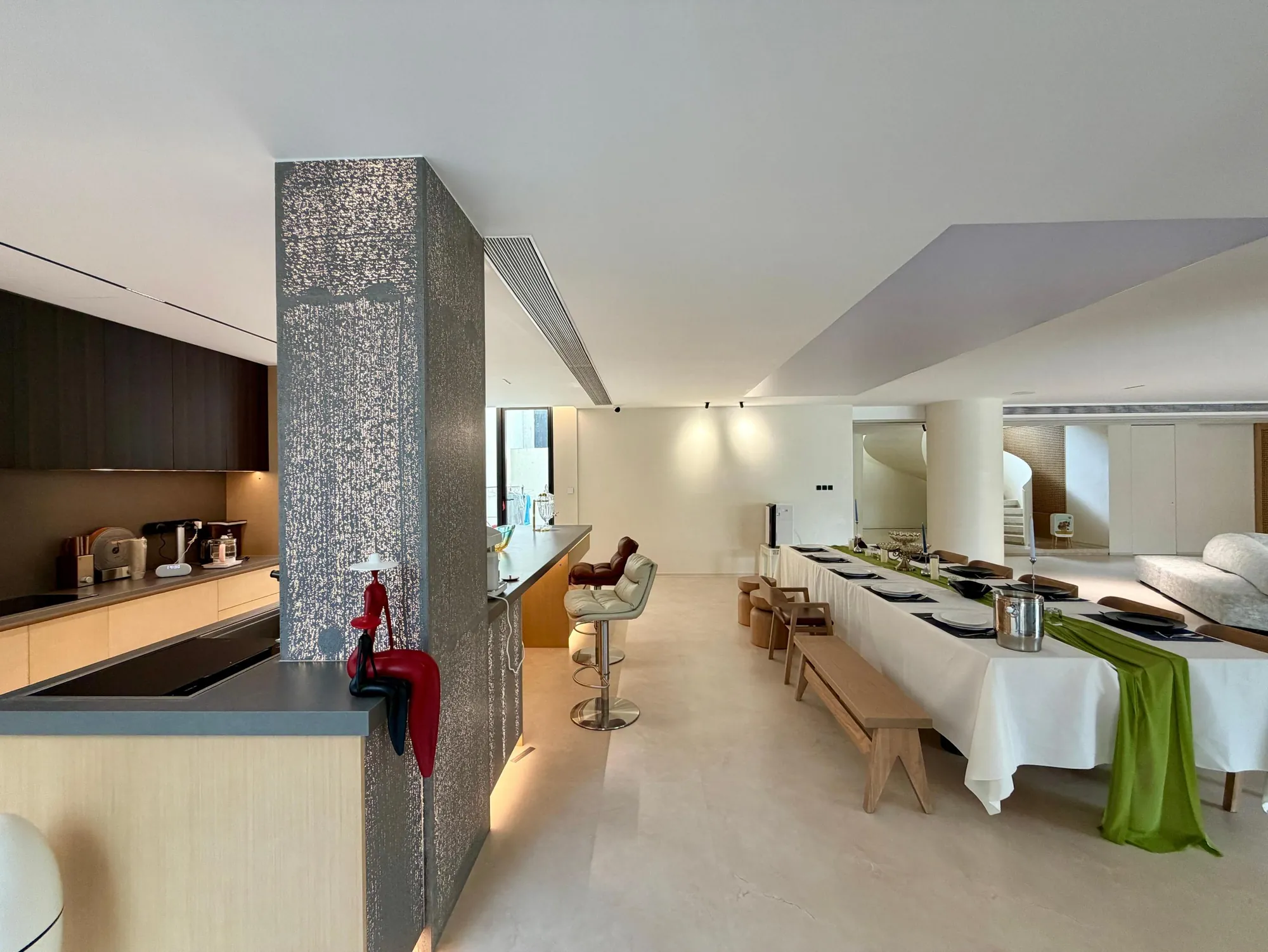 Open living kitchen and dining space with warm timber joinery
