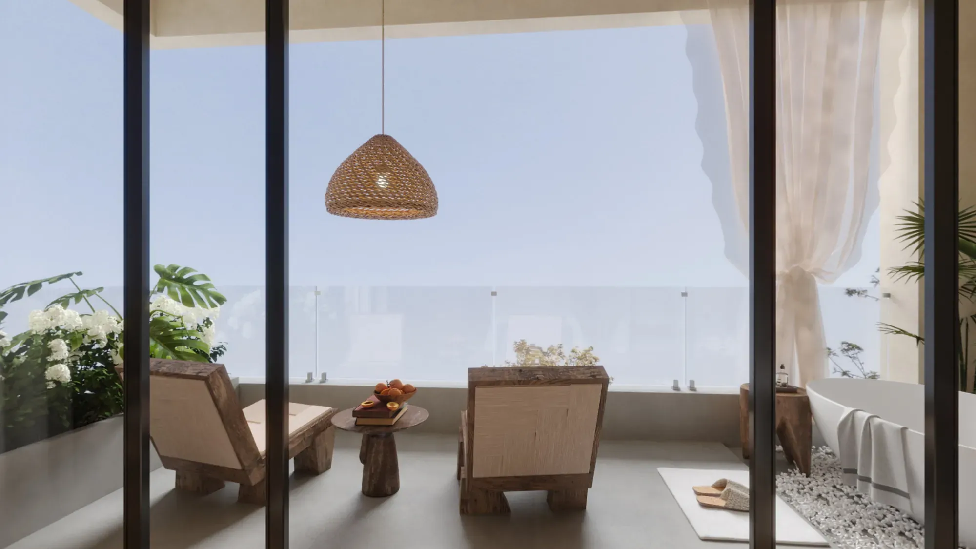 Guestroom opening to a private balcony with woven pendant and timber lounge chairs