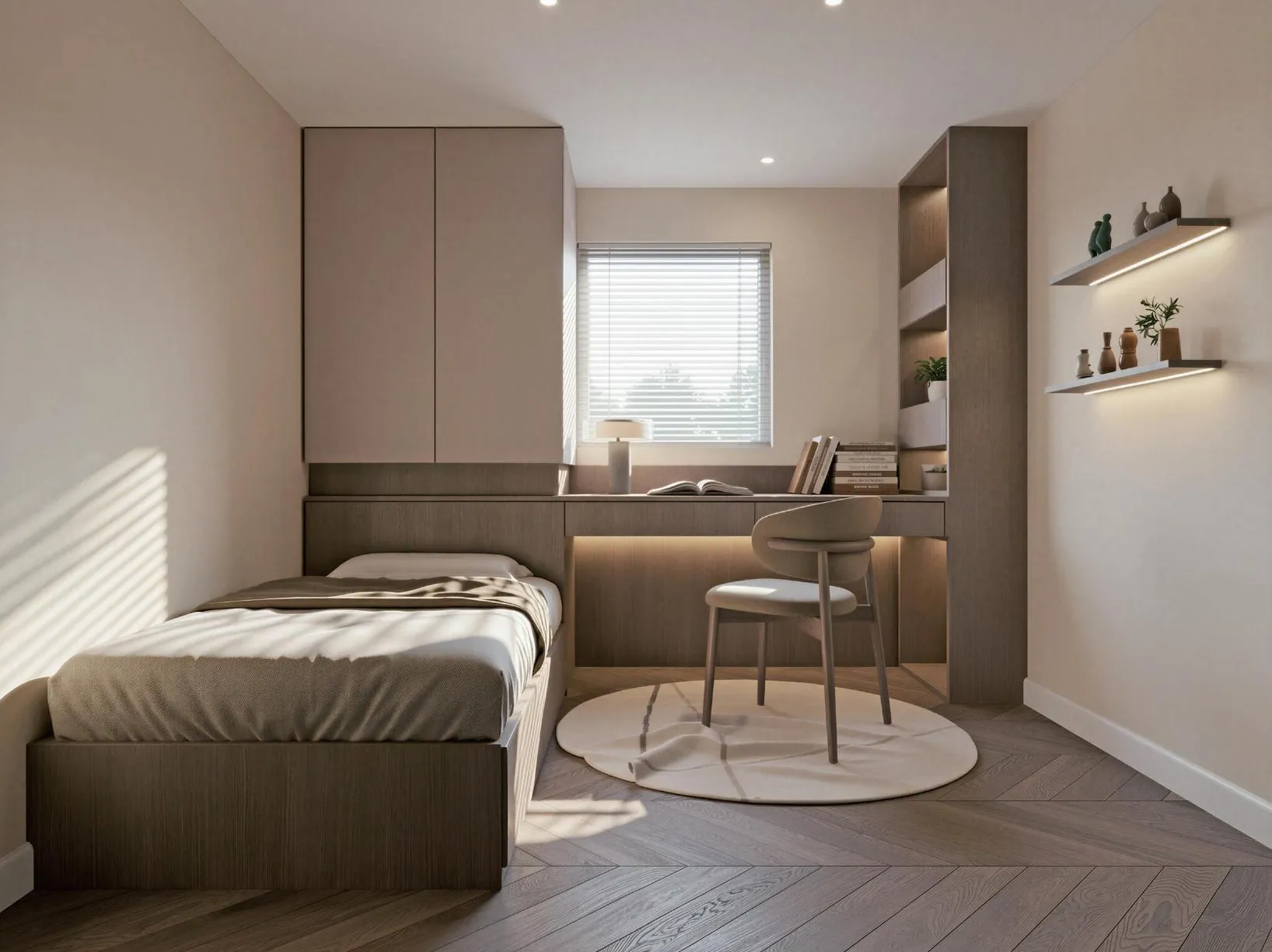 Compact bedroom with wall-aligned bed, window desk and integrated fitted storage