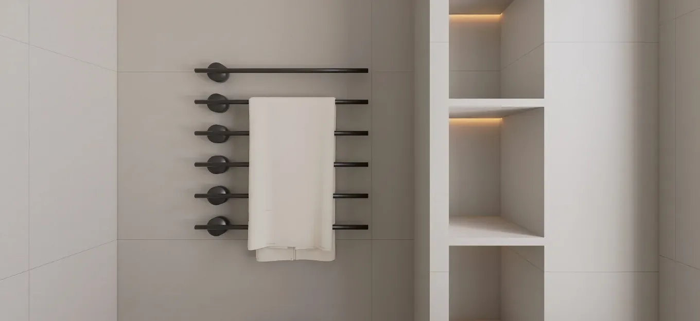 Minimal apartment bathroom with pale surfaces, dark linear towel rail and open niches