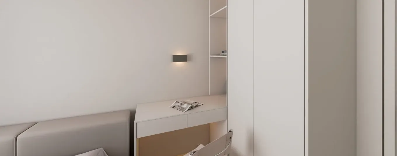 Children's bedroom with pale fitted storage and a restrained blue accent